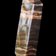 Chocolate Calcite obelisk 113*33*21mm 201g in sunlight - Rocks and Things Store