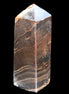 Chocolate Calcite obelisk 105*35*32mm 295g in sunlight - Rocks and Things Store