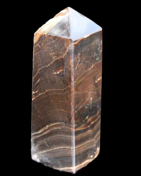 Chocolate Calcite obelisk 105*35*32mm 295g in sunlight - Rocks and Things Store