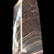 Chocolate Calcite obelisk 105*35*32mm 295g in sunlight - Rocks and Things Store