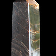 Chocolate Calcite obelisk 105*35*32mm 295g in sunlight - Rocks and Things Store