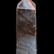 Chocolate Calcite obelisk 105*35*32mm 295g in sunlight - Rocks and Things Store