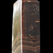 Chocolate Calcite obelisk 105*35*32mm 295g in sunlight - Rocks and Things Store