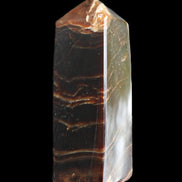 Chocolate Calcite obelisk 105*35*32mm 295g in sunlight - Rocks and Things Store