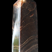 Chocolate Calcite obelisk 105*35*32mm 295g in sunlight - Rocks and Things Store