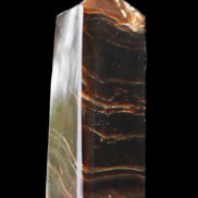 Chocolate Calcite obelisk 105*35*32mm 295g in sunlight - Rocks and Things Store