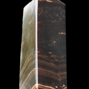 Chocolate Calcite obelisk 105*35*32mm 295g in sunlight - Rocks and Things Store
