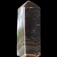Chocolate Calcite obelisk 105*35*32mm 295g in sunlight - Rocks and Things Store