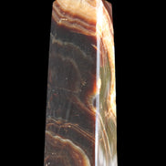 Chocolate Calcite obelisk 112*33*26mm 203g in sunlight - Rocks and Things Store