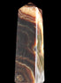 Chocolate Calcite obelisk 112*33*26mm 203g in sunlight - Rocks and Things Store