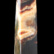 Chocolate Calcite obelisk 112*33*26mm 203g in sunlight - Rocks and Things Store