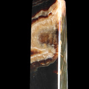 Chocolate Calcite obelisk 112*33*26mm 203g in sunlight - Rocks and Things Store