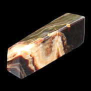 Chocolate Calcite obelisk 112*33*26mm 203g in sunlight - Rocks and Things Store