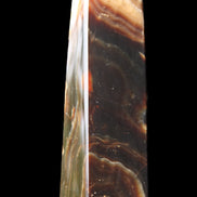 Chocolate Calcite obelisk 112*33*26mm 203g in sunlight - Rocks and Things Store