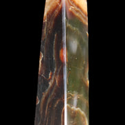 Chocolate Calcite obelisk 112*33*26mm 203g in sunlight - Rocks and Things Store