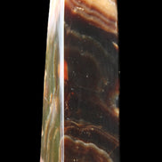 Chocolate Calcite obelisk 112*33*26mm 203g in sunlight - Rocks and Things Store