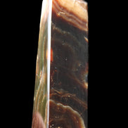 Chocolate Calcite obelisk 112*33*26mm 203g in sunlight - Rocks and Things Store