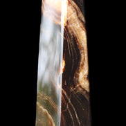 Chocolate Calcite obelisk 112*33*26mm 203g in sunlight - Rocks and Things Store