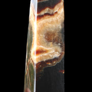 Chocolate Calcite obelisk 112*33*26mm 203g in sunlight - Rocks and Things Store