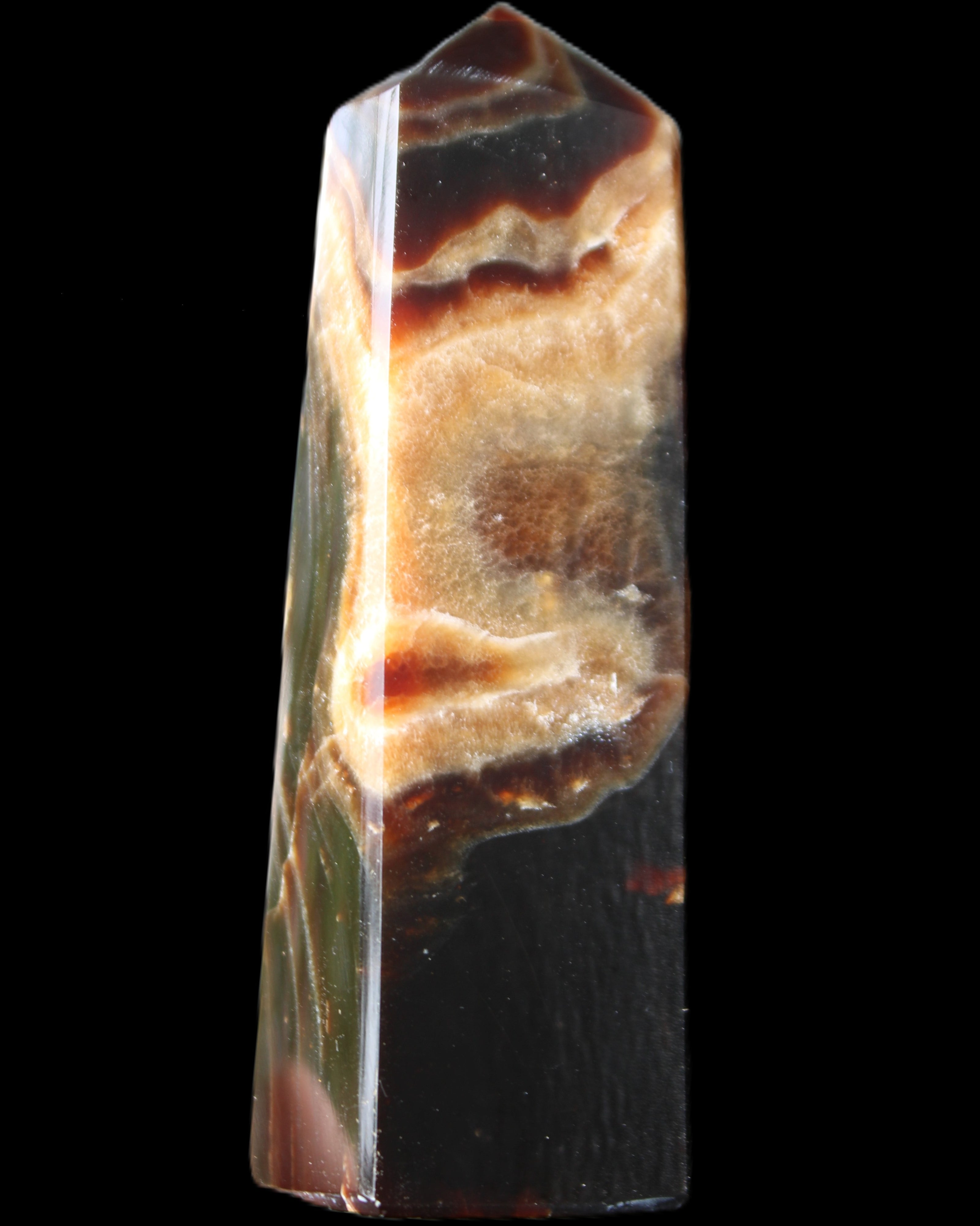 Chocolate Calcite obelisk 112*33*26mm 203g in sunlight - Rocks and Things Store