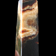 Chocolate Calcite obelisk 112*33*26mm 203g in sunlight - Rocks and Things Store