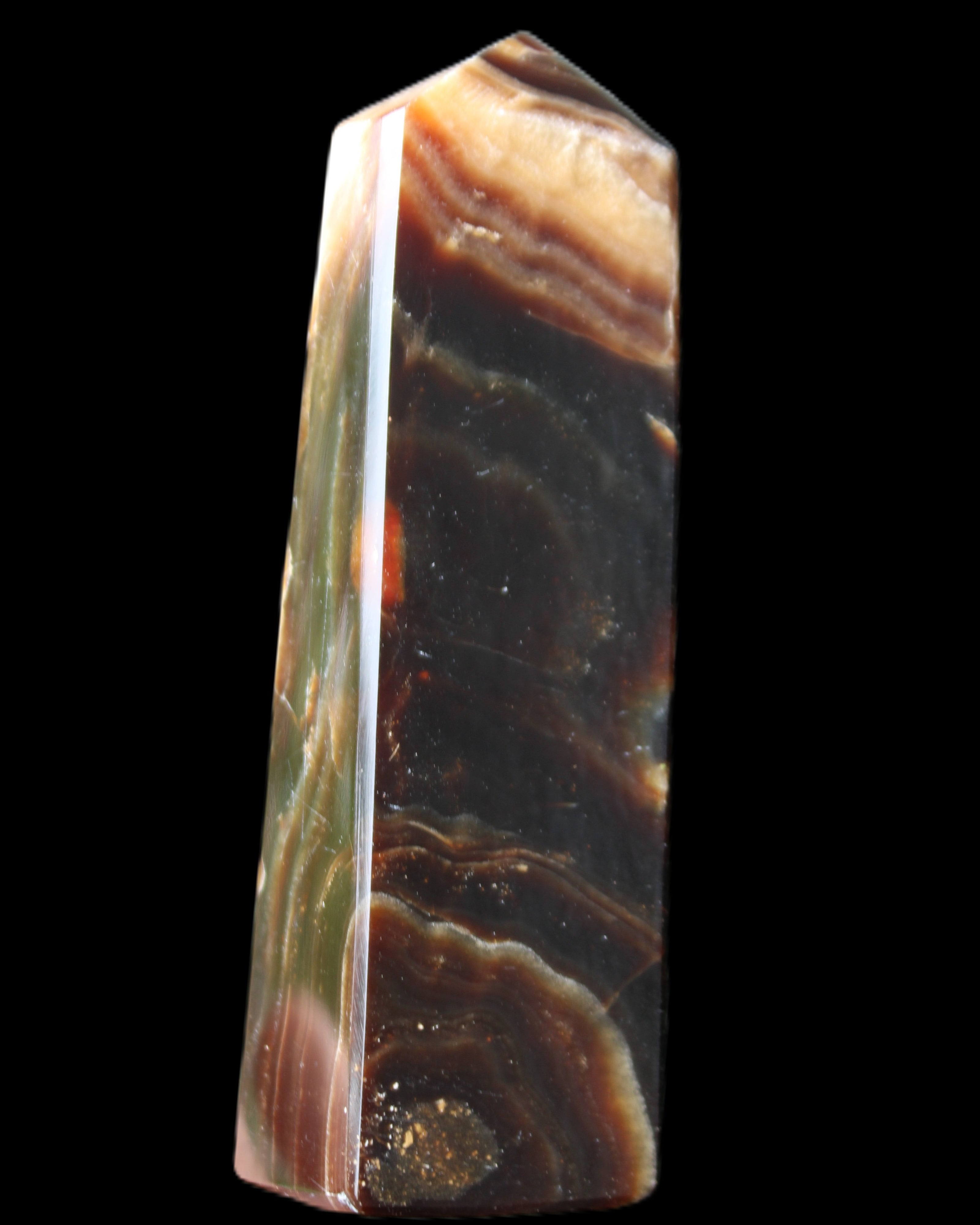 Chocolate Calcite obelisk 112*33*26mm 203g in sunlight - Rocks and Things Store