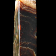 Chocolate Calcite obelisk 112*33*26mm 203g in sunlight - Rocks and Things Store