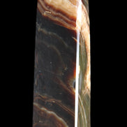 Chocolate Calcite obelisk 112*33*26mm 203g in sunlight - Rocks and Things Store