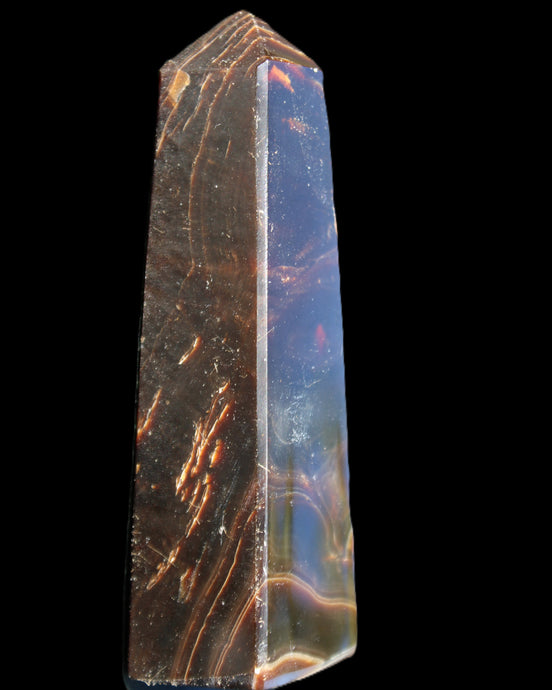 Chocolate Calcite obelisk 110*32*27mm 187g in sunlight - Rocks and Things Store