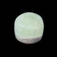 Pistachio Calcite tumbled stone 25-32mm 21-32g in sunlight - Rocks and Things Store