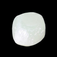 Pistachio Calcite tumbled stone 25-32mm 21-32g in sunlight - Rocks and Things Store