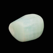 Pistachio Calcite tumbled stone 25-32mm 21-32g in sunlight - Rocks and Things Store