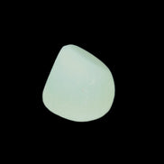 Pistachio Calcite tumbled stone 20-23mm 6-9g in sunlight - Rocks and Things Store
