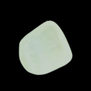 Pistachio Calcite tumbled stone 20-23mm 6-9g in sunlight - Rocks and Things Store