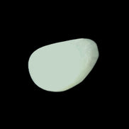 Pistachio Calcite tumbled stone 20-23mm 6-9g in sunlight - Rocks and Things Store
