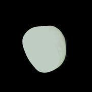 Pistachio Calcite tumbled stone 20-23mm 6-9g in sunlight - Rocks and Things Store