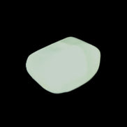 Pistachio Calcite tumbled stone 20-23mm 6-9g in sunlight - Rocks and Things Store
