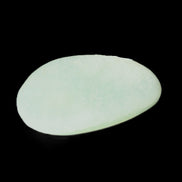 Pistachio Calcite tumbled stone 30-37mm 21-29g in sunlight - Rocks and Things Store
