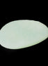 Pistachio Calcite tumbled stone 30-37mm 21-29g in sunlight - Rocks and Things Store