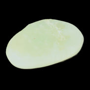 Pistachio Calcite tumbled stone 30-37mm 21-29g in sunlight - Rocks and Things Store