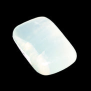 Pistachio Calcite tumbled stone 30-37mm 21-29g in sunlight - Rocks and Things Store