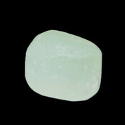 Pistachio Calcite tumbled stone 30-37mm 21-29g in sunlight - Rocks and Things Store