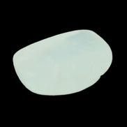 Pistachio Calcite tumbled stone 30-37mm 21-29g in sunlight - Rocks and Things Store