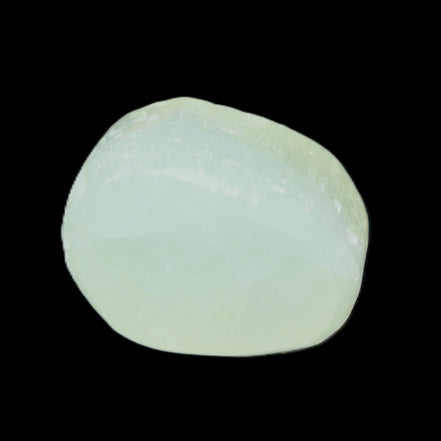 Pistachio Calcite tumbled stone 30-37mm 21-29g in sunlight - Rocks and Things Store