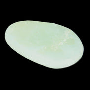 Pistachio Calcite tumbled stone 30-37mm 21-29g in sunlight - Rocks and Things Store