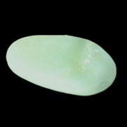 Pistachio Calcite tumbled stone 30-37mm 21-29g in sunlight - Rocks and Things Store