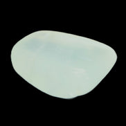 Pistachio Calcite tumbled stone 30-37mm 21-29g in sunlight - Rocks and Things Store