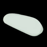 Pistachio Calcite tumbled stone 30-37mm 21-29g in sunlight - Rocks and Things Store