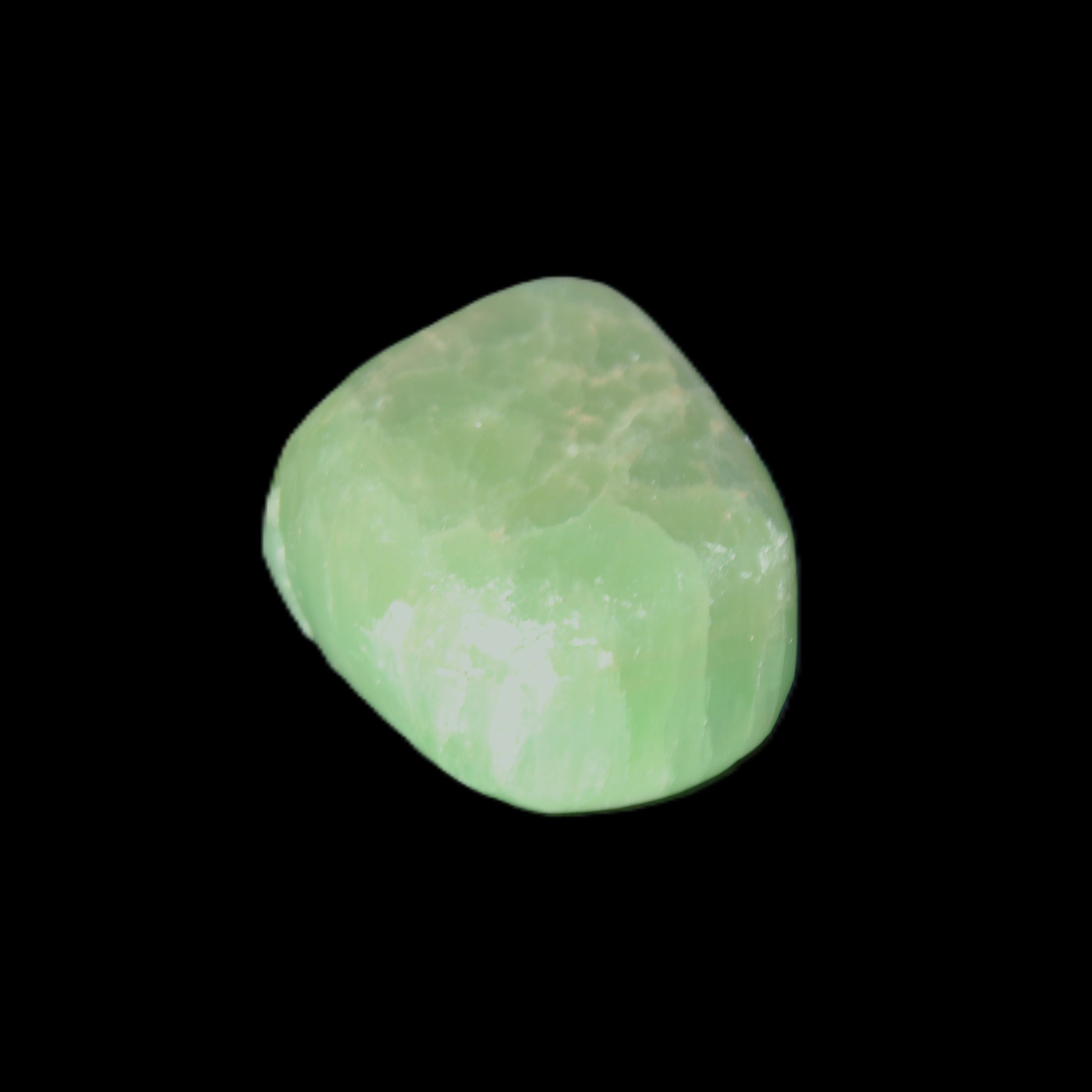 Green Aragonite tumbled stone 23*21*15mm 18g in sunlight - Rocks and Things Store