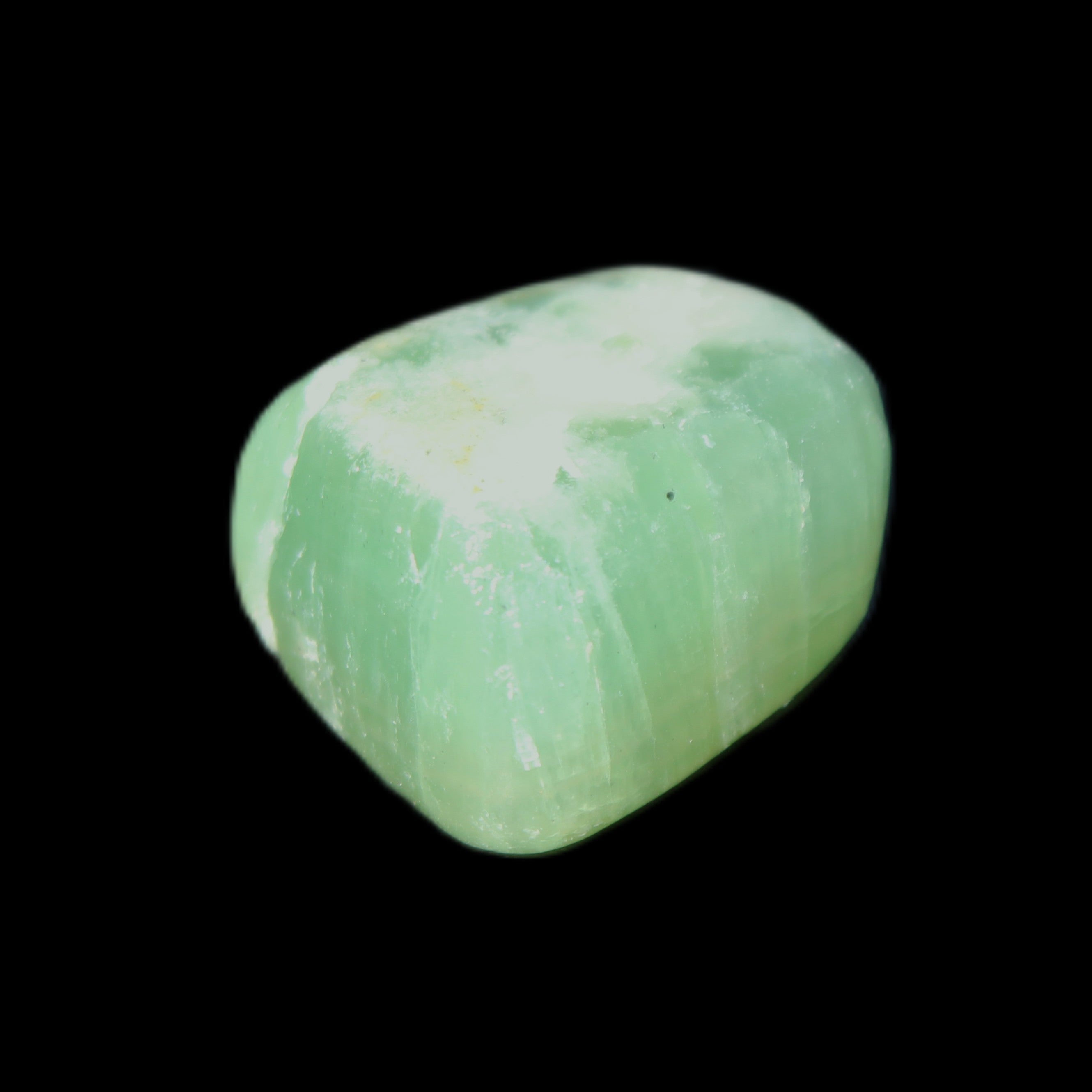 Green Aragonite tumbled stone 23*21*15mm 18g in sunlight - Rocks and Things Store